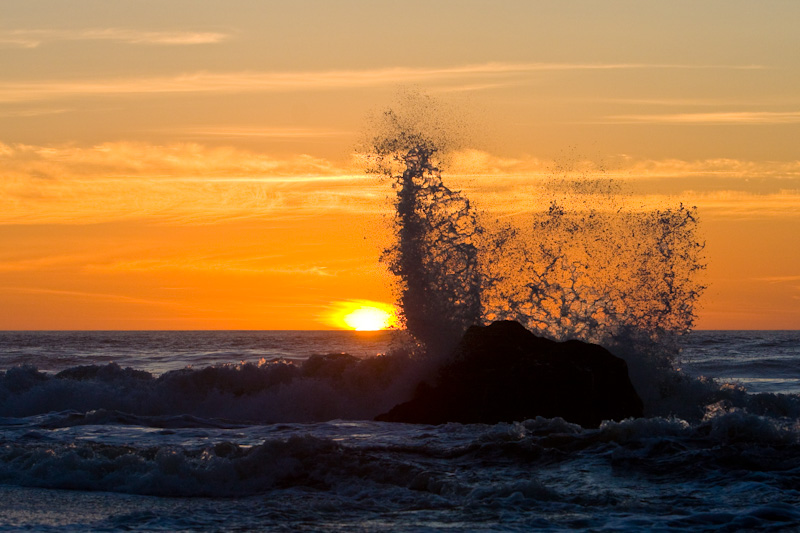 Sun Setting Behind Waves